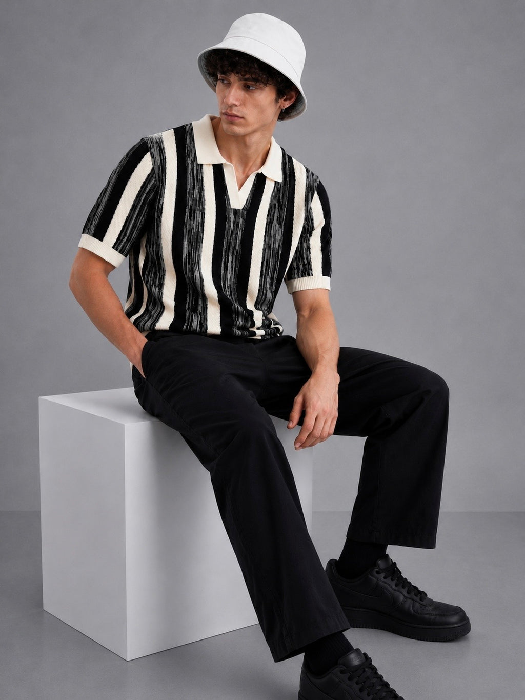 BLACK MELANGÉ KNIT POLO