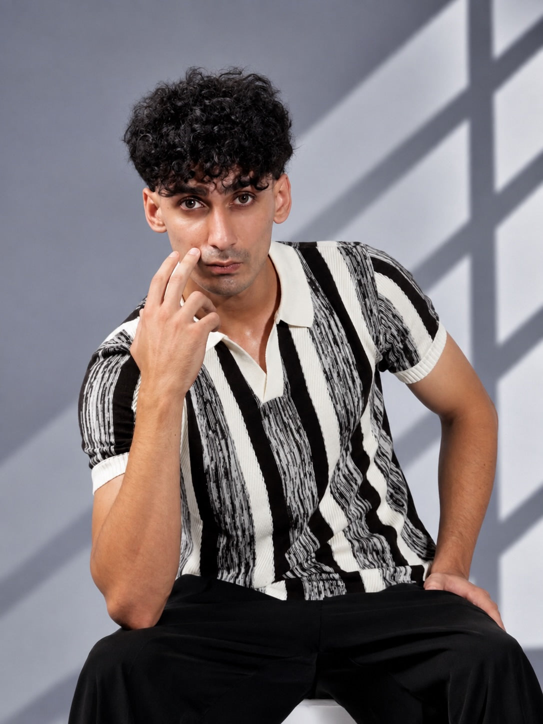BLACK MELANGÉ KNIT POLO