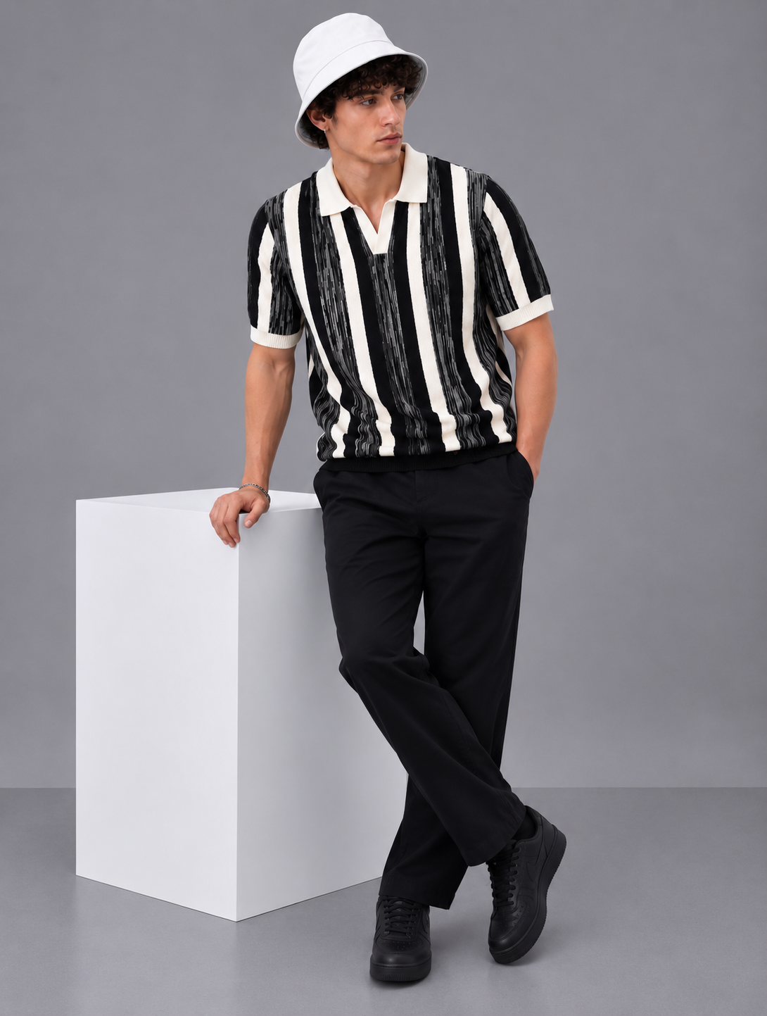 BLACK MELANGÉ KNIT POLO
